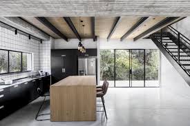 Industrial Interior Design Black Kitchen Concrete Floor Metal Staircase Exposed Metal Beams Interior Design By Shir Shtaigman Photography Itay Benit Cucine