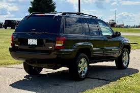 Image result for Brilliant Black 2003 Jeep
