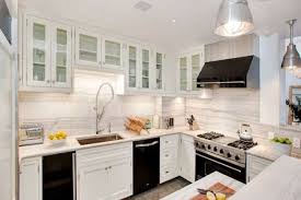 These are usually crated with grey lower or upper cabinets, but in this case, the kitchen appliances. Black Appliances And White Or Gray Cabinets How To Make It Work Kitchen Cabinets With Black Appliances Black Appliances Kitchen White Cabinets Black Appliances
