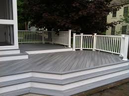 Alluring Brown Color Trex Decking With Terrace Decoration Ideas Feature White Laminated Wooden Railing And Gray Lam Decks And Porches Wood Deck Decking Options