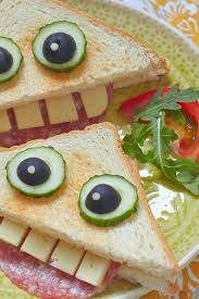 Kid S Lunch Sandwich Made With Meat Cheese Cucumber Olives Fun Food Face Food Food Art For Kids Fun Kids Food