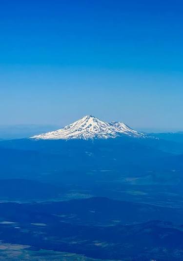 View of Mt. Shasta from airplane window flying into Medford, Oregon
