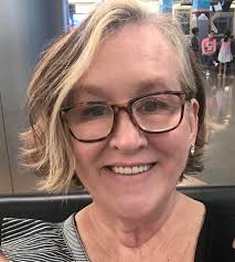 Can someone edit my headshot to soften wrinkles and adjust the background?