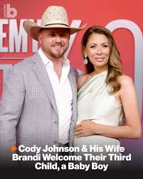 Cody Johnson and his wife Brandi Johnson welcomed their third ...