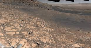 The foreground shows two depressions likely carved out by blasts from the rover's descent stage thrusters. Nasa Mars Photo What Does The Planet Look Like In High Resolution Thrillist