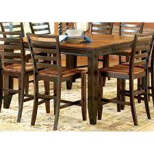 This simple sophisticated table comes in dark brown finish and has long and tapered legs. Abaco Counter Height Table With Butterfly Leaf Dcg Stores
