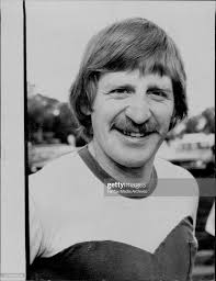 Ray Wood (right) and Peter McParland leave the field together after the  Final in which the two collided and Wood fractured a cheek bone. (1957)