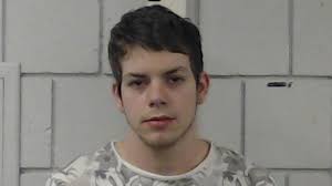 Pair charged in burglary