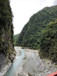 Countable noun oft in names a valley is a low stretch of land between hills, especially one that has a river flowing through it.a wooded valley set against the backdrop of monte rosa. Liwu River Valley Live Life And Love