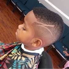 Bangs hairstyle can be a great way to enhance the beauty of the innocent toddlers. Black Boys Haircut With Design