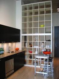 10 Gorgeous Ways To Stage Your Ikea Expedit Bookshelf Must Glue Down The Lower Items If You Have Little Ones Or Put Their Books On Th Ikea Bookcase Ikea Decor