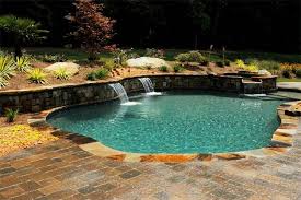 If you plan everything correctly, you'll even. How To Build A Pool What To Do With A Sloped Backyard Sloped Backyard Backyard Pool Landscaping Building A Pool