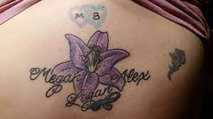 Fire Lily With Kids Name And A Hydrocephalus Ribbon Tattoo Firelilly Kidsnames Hydrocephalus Lily Tattoo Tattoos With Kids Names Tattoos