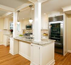 Cooktops might be placed in the wrong spot. Support Beams As Decorative Columns Kitchen Traditional With Stainless Steel Appliances In Ceili Kitchen Remodel Kitchen Under Stairs Stools For Kitchen Island