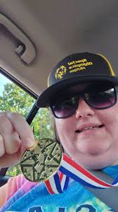 Second place in the 50 meter ￼walk in first place in the softball throw.