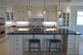 Rich oak staircase leading to 2nd floor with updated wide plank hardwood, 3 spacious bedrooms and bedroom level laundry. Royal Kitchen Doors And Cabinets