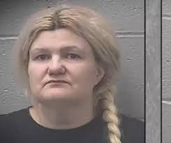 KKK leader's wife, stepson charged in his death