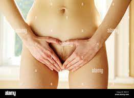 Naked woman abdomen Stock Photo - Alamy