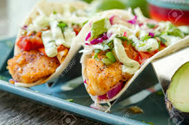Maybe you would like to learn more about one of these? Close Up Of Homemade Fish Tacos Sitting On Blue Plate With Blue Corn Tortilla Chips And Salsa Stock Photo Picture And Royalty Free Image Image 73932898