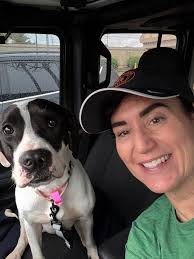 After playing with the hose for a while, Orion enjoyed a nice roll to dry  off.