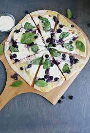 To cook by putting the food into extremely hot oil. My Current Favorite Pizza Blueberries And Spinach With Creamy White Sauce A Beautiful Mess