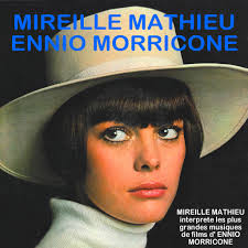 Here I am with the great Mireille Mathieu in 1979. Who can name the song we  were putting together? ⤵️