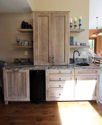 Has told us that cherry tends to show more of a grain while maple shows less and cherry will darken over. Rustic Dining Room Wet Bar With Cherry Cappuccino Cabinets And Quartz Countertop Rustic Dining Room Cleveland By Cabinet S Top Houzz