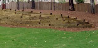 When retaining walls are built, they slope slightly to one side in order to improve drainage. How To Build A Wood Retaining Wall On Slope Paulbabbitt Com