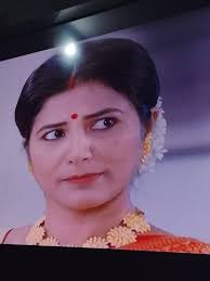 Suspicious behavior of a woman feeding her son sweets