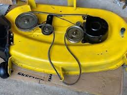 Remove the belt guard located on top of the mower deck by removing the cap screws from the guard with an allen wrench. John Deere L100 Deck Belt Diagram Off 54