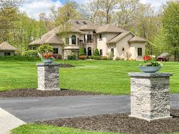 In pleasanton, ca recommends them highly because you can get the look of stucco, cast concrete, or stone for your columns without the expense and difficulty of using those materials. Planting Red Geraniums In Bowl Planters On Outdoor Columns Four Generations One Roof