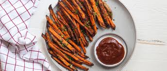 Cut the 1 pound sweet potatoes into matchsticks about 1/4″ thick and toss with vegetable oil or olive oil, 2 tablespoons cornstarch, 1 teaspoon kosher salt and 1/2 teaspoon black pepper. How To Make Crispy Sweet Potato Fries In Your Oven That Aren T Soggy