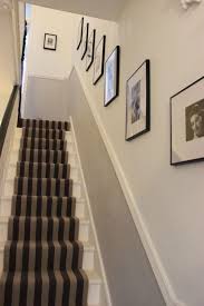 9 ways to decorate your front door for the holidays. Do You Like The Layout Of The Photos Along The Staircase In 2020 Narrow Hallway Decorating Stair Decor Small Hallway Decorating