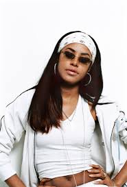 Aaliyah is effortlessly cool in faux fur white coat and black shades getty. 12 Throwback Photos Of Aaliyah S Iconic Style Essence