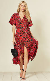 cape sleeve wrap dress in red black print silkfred exclusive by cutie london