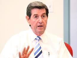 Candidate says probe Riley's possible conflicts of interest