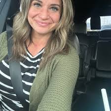 Crossing guard hands out pick me up cards to kids