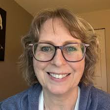 Zero Ave is Canadian. The border marker is in the grass