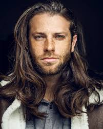 Thick hair becomes soft and smooth with this wavy style. 10 Modern Long Hairstyles For Men