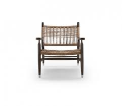 It has 6 round section legs. Tessa Armchairs Ottomans