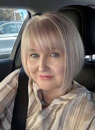 I love my short hairstyle and my grey hair at 67 yrs old! 😍