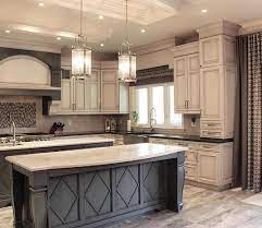 Example of a huge country porcelain floor and brown floor kitchen pantry design in chicago. Best Antique White Kitchen Ideas For 2020 Best Online Cabinets