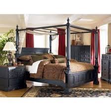 Ashley Furniture Black And White Bedroom Set Ashley Furniture Rowley Creek King Poster Bed W Canopy By Ashley Black With Images Home Decor Catalogs Ashley Furniture Bedroom Canopy Bedroom Sets