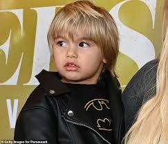 Aaron Carter's son, 3, makes red carpet debut as he looks just like his  famous dad who died 2 years ago