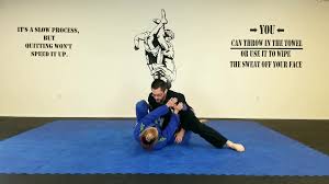 Jason Dignan a black belt in both BJJ and Judo shows a driving version of  osoto gari