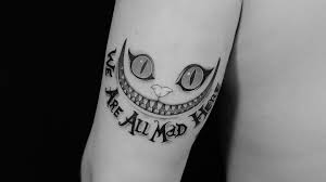 We Are All Mad Here Alice In Wonderland Cat Tattoo By Lonewolf Gd Small Tattoos Alice And Wonderland Tattoos Trendy Tattoos