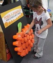 Poke A Pumpkin Filled With Tricks And Treats We Should Do This For Fall Fest Next Year Halloween Party Kids Birthday Halloween Party Kid Friendly Halloween