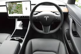 It's quite an event sliding behind the wheel of a tesla model 3 for the first time. Tesla Model 3 Long Range Review Greencarguide Co Uk