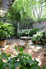 A Curious Gardener Southern Courtyard Courtyard Gardens Design Garden Seating Area Small Courtyard Gardens