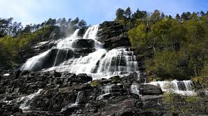 Tvindefossen (i've also seen it spelled tvinnefossen) was a gorgeous 152m waterfall tumbling in indeed, tvindefossen literally sat right off the e16 motorway as it was also close enough to the town. Tvindefossen Waterfall Nature Free Photo On Pixabay